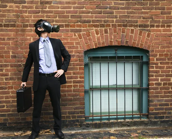 stock image Businessman wearing gas mask.