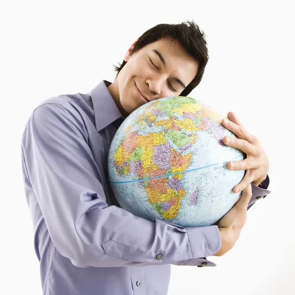 Man hugging globe — Stock Photo, Image