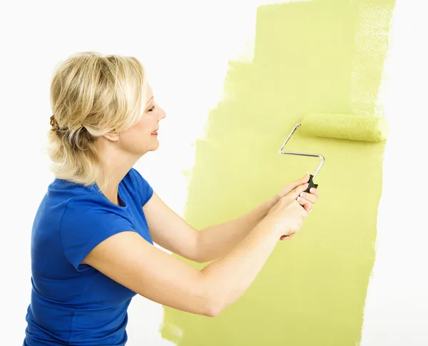 Kvinnans målning vägg. — Stockfoto