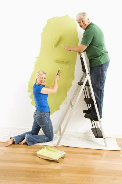 Couple painting wall. — Stock Photo, Image