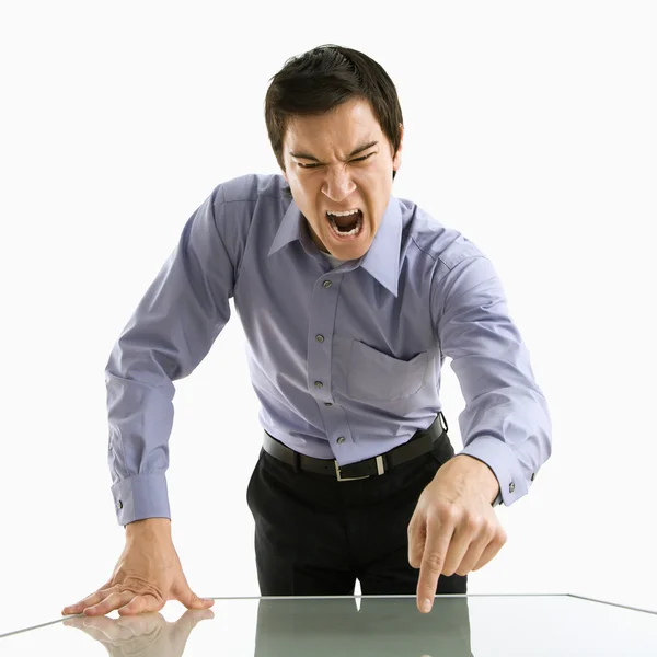 Businessman yelling. Stock Picture
