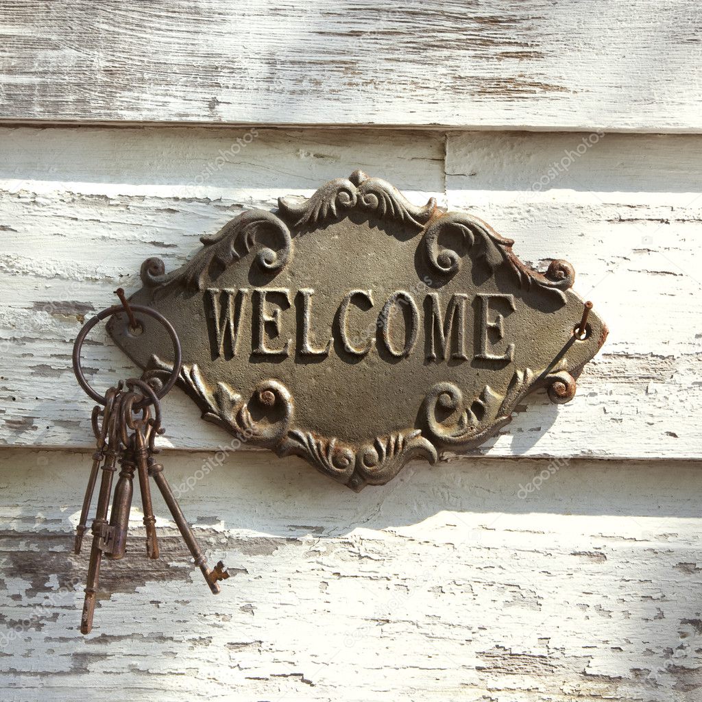 Welcome sign on wall.