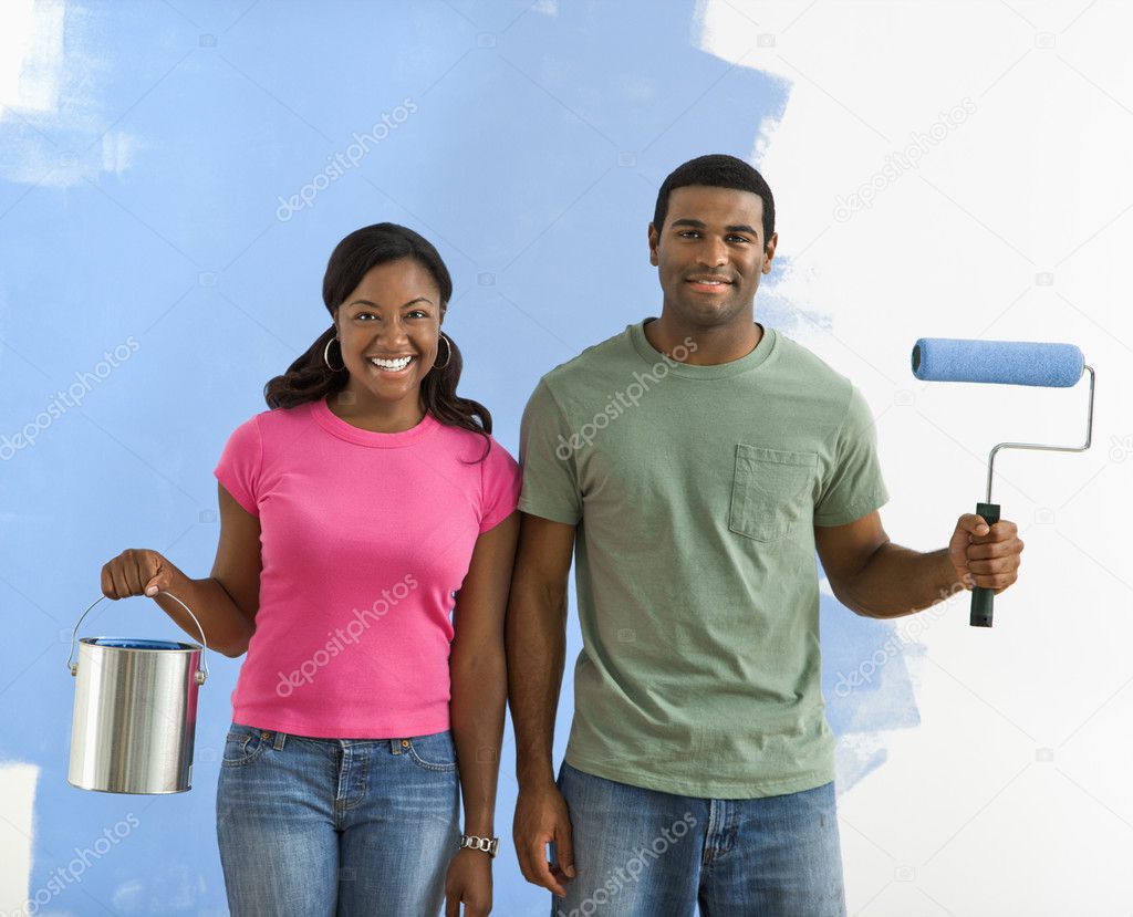 Couple with paint supplies.