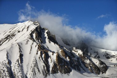 Snowcapped mountains. clipart