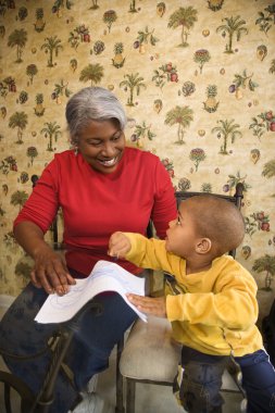 Grandmother and grandson coloring. clipart