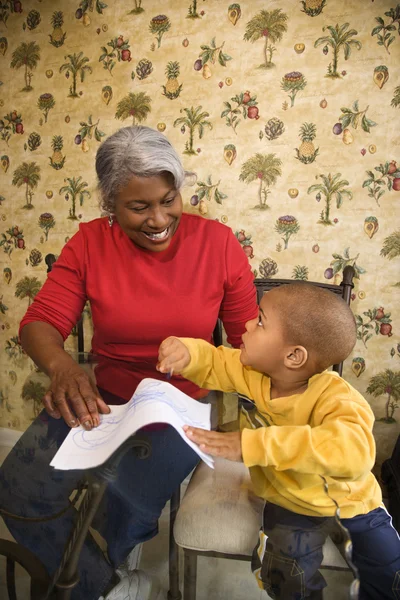 Grandmother and grandson coloring. — Stock Photo, Image