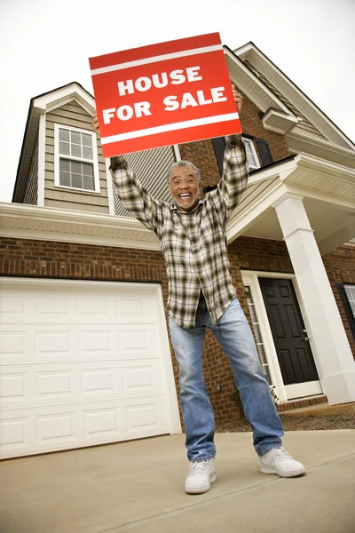 Man with house. — Stock Photo, Image