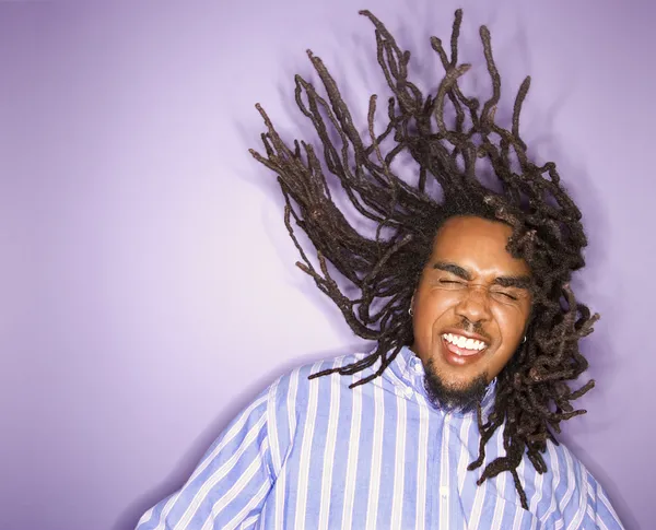 African-American man with his dreadlocks in motion. — Stock Photo, Image