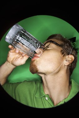 Man drinking beer. clipart