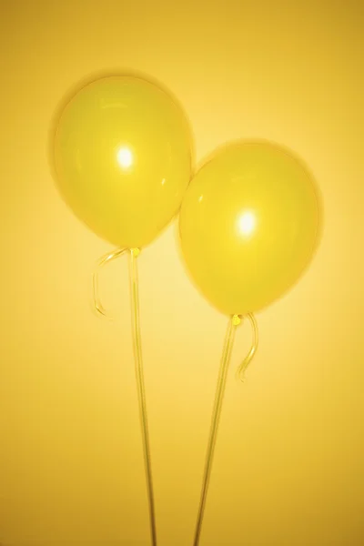 Two yellow balloons. — Stock Photo, Image