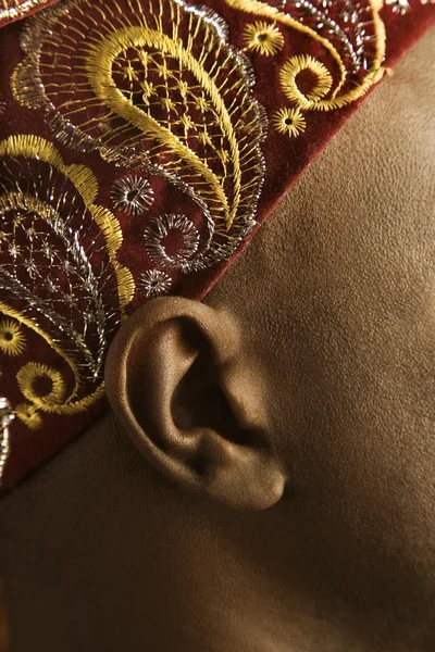 Ear and patterned headband. — Stock Photo, Image