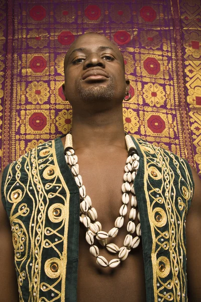 Man in African garments. — Stock Photo, Image