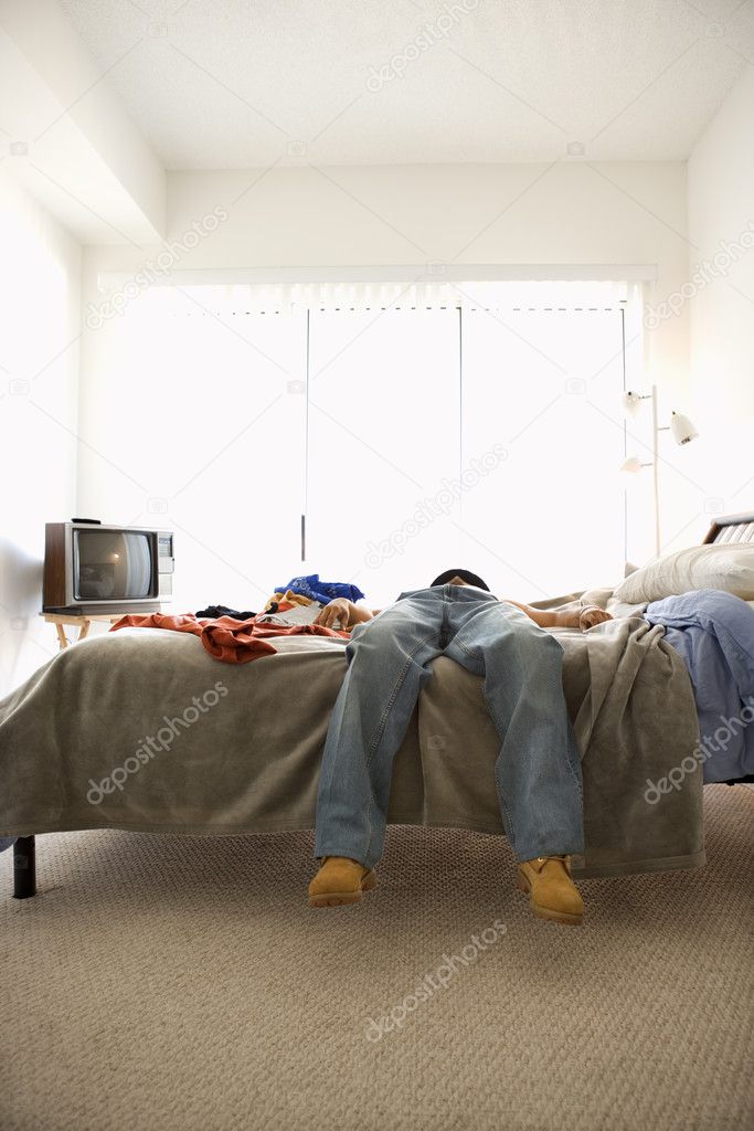 Man Lying on Bed