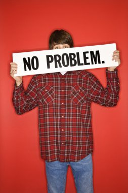 Boy holding sign. clipart