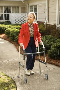 Elderly Woman Using Walker clipart