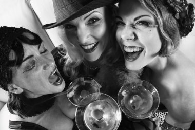 Three retro women drinking. clipart