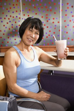 Woman with health shake. clipart