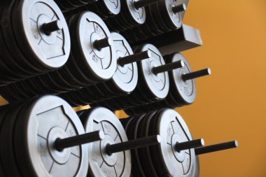 Stacked barbells with weights. clipart