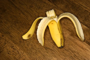 Half eaten banana. clipart