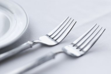 Forks on Dining Table clipart