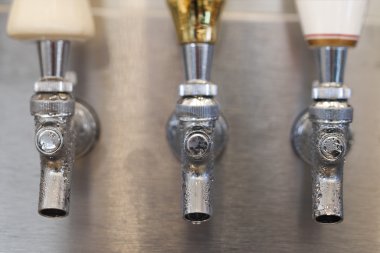 Trio of Beer Tap Spouts clipart