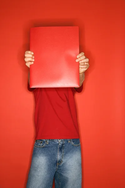 Boy holding notebook. — Stock Photo, Image