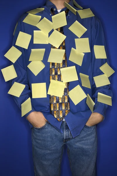 Junge mit klebrigen Zetteln überzogen. — Stockfoto