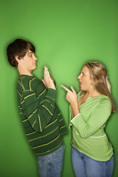 Teen boy and girl fighting. — Stock Photo, Image
