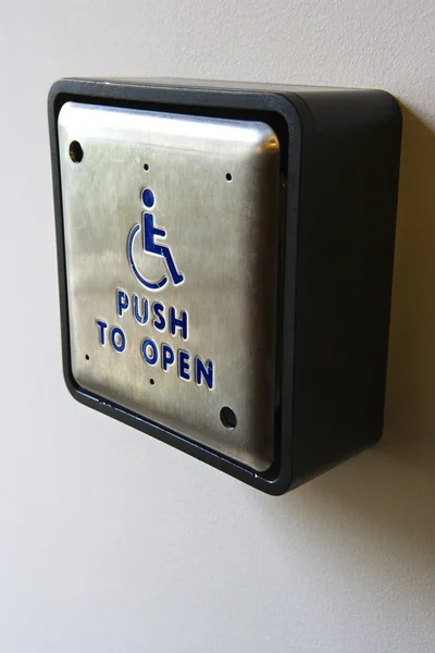 Handikapp push att öppna button.l — Stockfoto