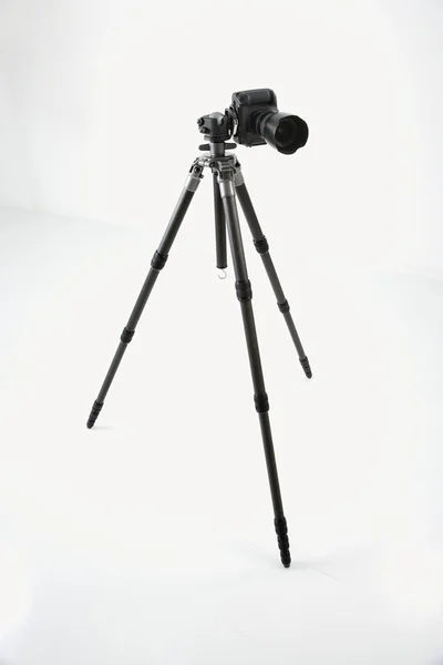 stock image Camera and tripod.