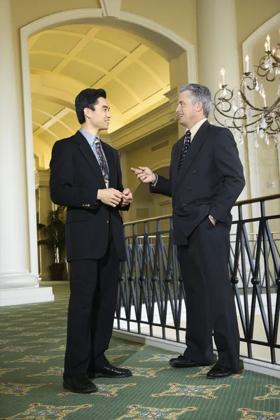 Two businessmen in hotel. — Stock Photo, Image