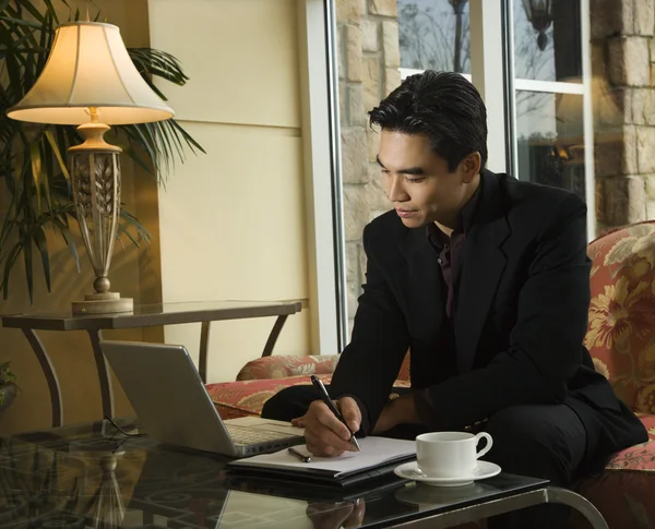 Young Businessman using Laptop — Stock Photo, Image