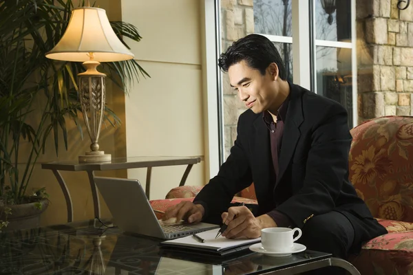 Young Businessman using Laptop — Stock Photo, Image
