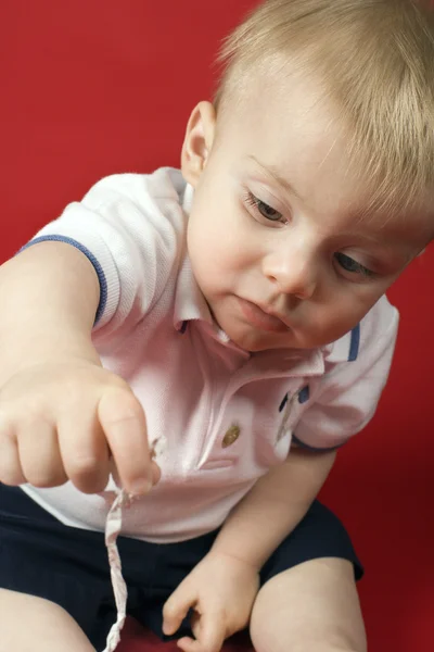 Baby boy playing. — Stock Photo, Image