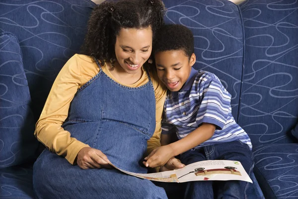 Woman Reading Book to Son — Stock Photo, Image