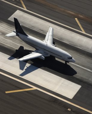 Airplane on runway. clipart