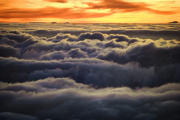 Sunrise over clouds. — Stock Photo, Image