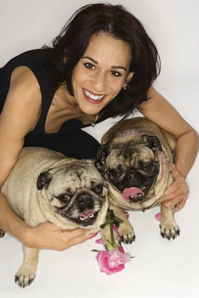 Woman with two Pug dogs. — Stock Photo, Image