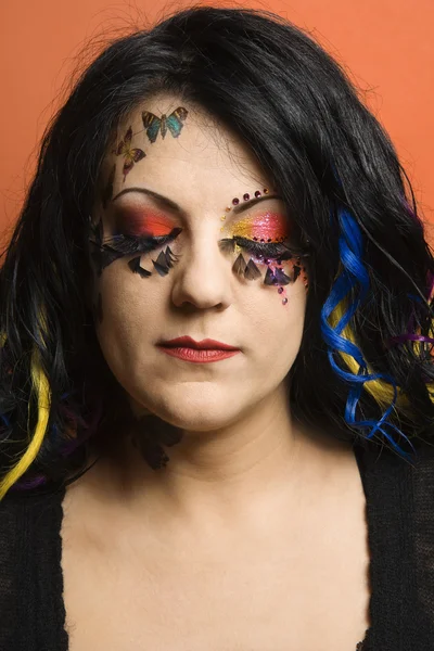 Woman wearing unique makeup. — Stock Photo, Image