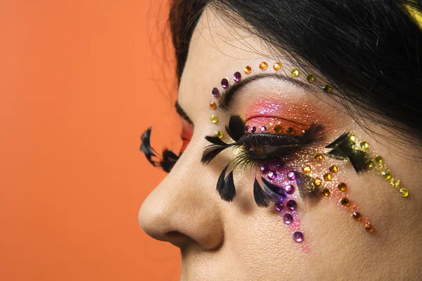 Woman wearing unique makeup. — Stock Photo, Image