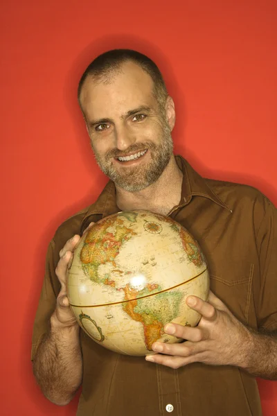 Man holding globe. — Stock Photo, Image