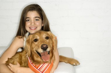 Smiling girl and dog. clipart