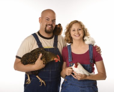 Woman and man with chickens. clipart
