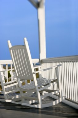 Rocking chairs on porch. clipart