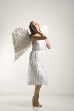 Woman in angel costume. clipart