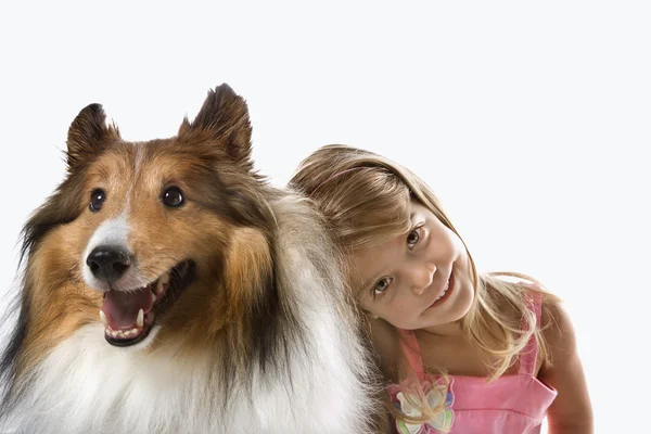 Meisje kind met collie hond. — Stockfoto