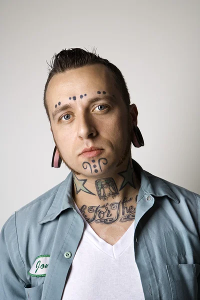 Ember a tetoválás és piercingek. — Stock Fotó