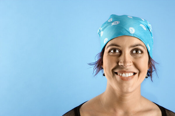 Young woman wearing bandana.