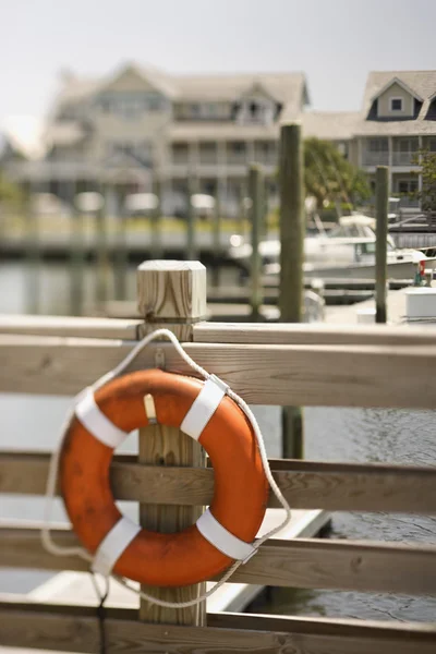 Life preserver on dock. — Stock Photo, Image