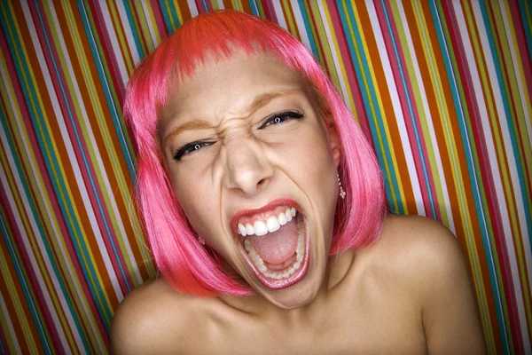 Woman in pink wig. — Stock Photo, Image